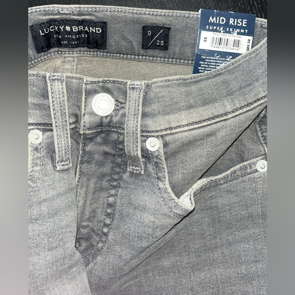 Lucky Brand grey and black jeans. Mid rise super skinny Ava
